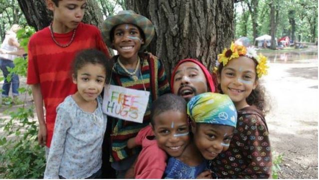 Markis, Hannah, Devonte, Jeremiah, the man, Sierra and Abigail with an unidentified man at the 2013 Minnesota festival celebrating the Earth