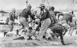 John Lewis' skull was fractured during a march in Selma, MI.