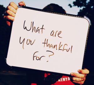 Person Holding Sign about Thanks