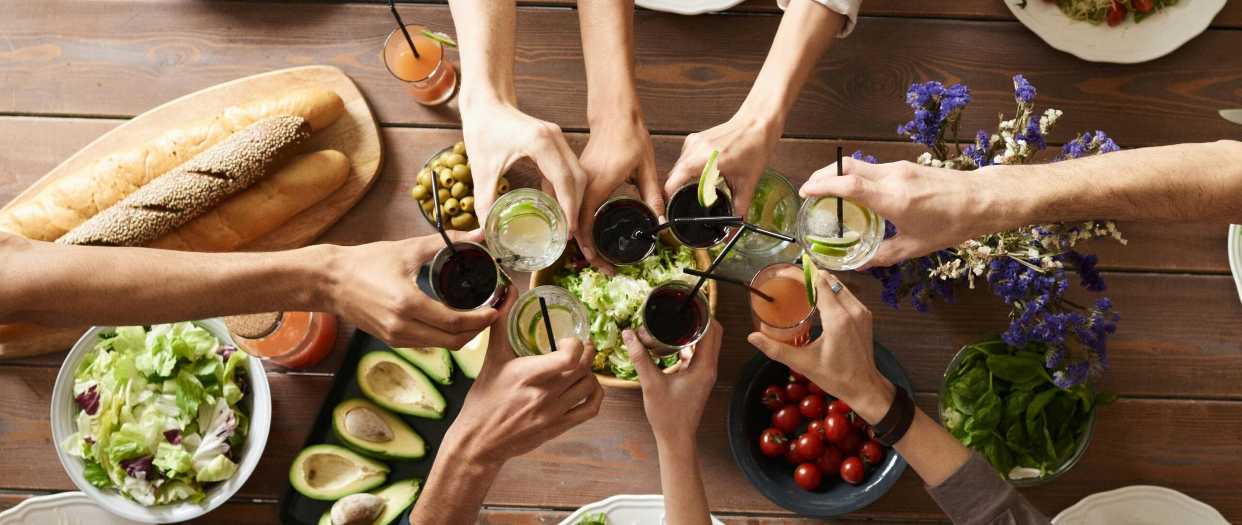 People Toasting around a Table